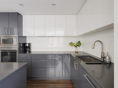 204-838 Broughton St, Victoria, BC - Indoor Photo Showing Kitchen With Double Sink