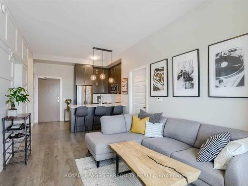 612-1105 Leger Way, Milton, ON - Indoor Photo Showing Living Room