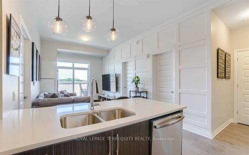 612-1105 Leger Way, Milton, ON - Indoor Photo Showing Kitchen With Double Sink