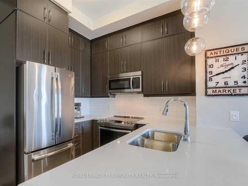 612-1105 Leger Way, Milton, ON - Indoor Photo Showing Kitchen With Double Sink With Upgraded Kitchen