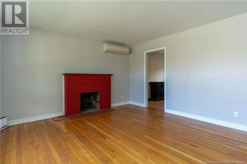 16 Alward, Saint John, NB - Indoor Photo Showing Living Room With Fireplace