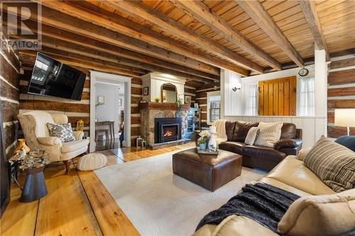 160 Poplar Ridge Road, Pembroke, ON - Indoor Photo Showing Living Room With Fireplace