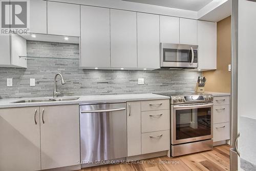 1908 - 362 The East Mall, Toronto, ON - Indoor Photo Showing Kitchen With Stainless Steel Kitchen With Double Sink With Upgraded Kitchen