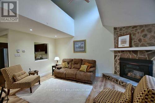 13 Trafalgar Road, Collingwood, ON - Indoor Photo Showing Living Room With Fireplace