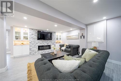 224 Caruhel, Lakeshore, ON - Indoor Photo Showing Living Room With Fireplace