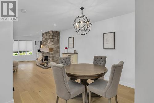 475 Eldorado Road, Kelowna, BC - Indoor Photo Showing Dining Room With Fireplace