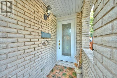 The covered front porch invites you into this move-in ready 3+2 bedroom home - 86 Green Maple Drive, St. Catharines, ON - Outdoor With Exterior