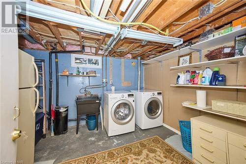 Large laundry room - washing machine and gas dryer included - 86 Green Maple Drive, St. Catharines, ON - Indoor Photo Showing Laundry Room