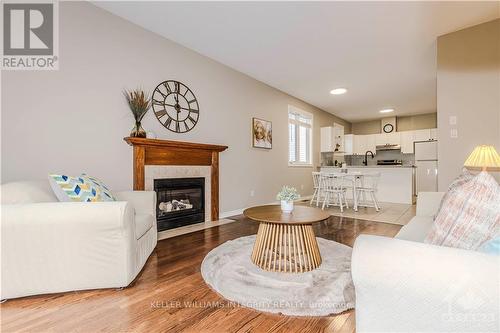 48 Maricona Way, Ottawa, ON - Indoor Photo Showing Living Room With Fireplace