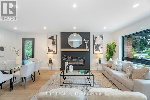 5 Rowse Crescent, Toronto, ON - Indoor Photo Showing Living Room With Fireplace