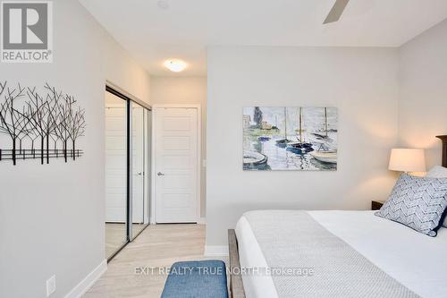 C404 - 301 Sea Ray Avenue, Innisfil, ON - Indoor Photo Showing Bedroom