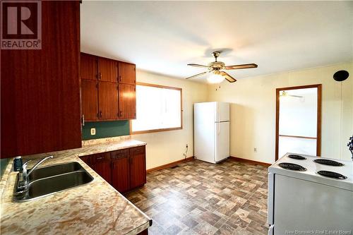 338 Route 176, Pennfield, NB - Indoor Photo Showing Kitchen With Double Sink