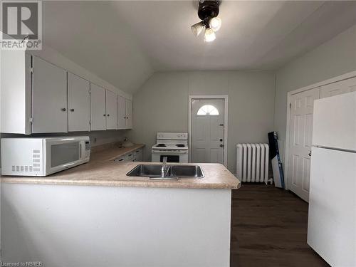 Unit 4 - 2 bed middle level - 525 High Street, North Bay, ON - Indoor Photo Showing Kitchen With Double Sink