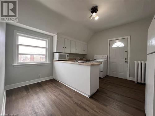 Unit 4 - 2 bed middle level - 525 High Street, North Bay, ON - Indoor Photo Showing Kitchen With Double Sink