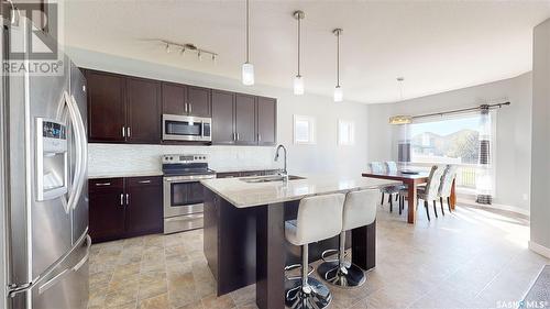 5331 Universal Crescent, Regina, SK - Indoor Photo Showing Kitchen With Stainless Steel Kitchen With Upgraded Kitchen