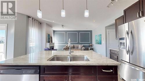 5331 Universal Crescent, Regina, SK - Indoor Photo Showing Kitchen With Stainless Steel Kitchen With Double Sink With Upgraded Kitchen