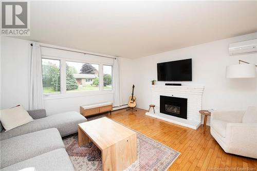 28 Galaxy Drive, Moncton, NB - Indoor Photo Showing Living Room With Fireplace