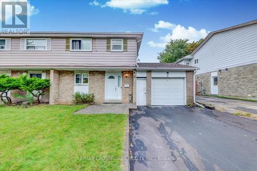 98 Berner Trail, Toronto, ON - Outdoor With Facade