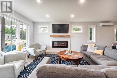 32 Flagstone Court, Riverview, NB - Indoor Photo Showing Living Room With Fireplace