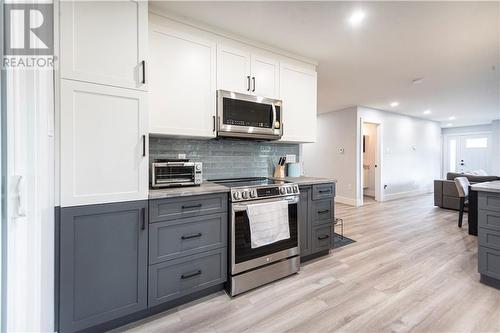 32 Flagstone Court, Riverview, NB - Indoor Photo Showing Kitchen With Upgraded Kitchen