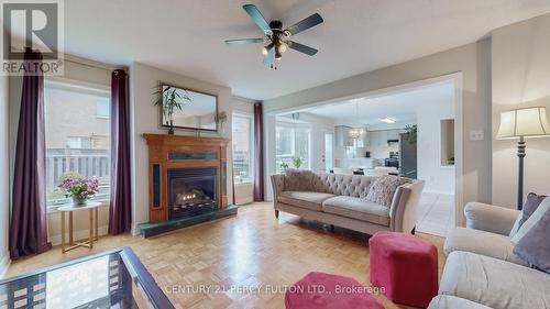 14 Australia Drive, Brampton, ON - Indoor Photo Showing Living Room With Fireplace