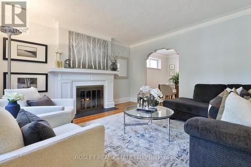 141 Sutherland Drive, Toronto, ON - Indoor Photo Showing Living Room With Fireplace