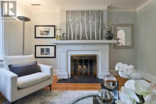 141 Sutherland Drive, Toronto, ON - Indoor Photo Showing Living Room With Fireplace