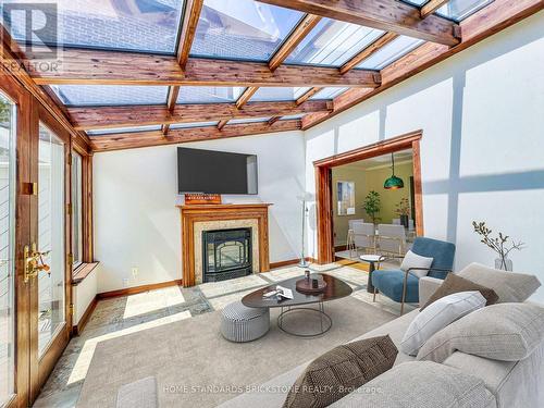 45 Madawaska Avenue S, Toronto, ON - Indoor Photo Showing Living Room With Fireplace