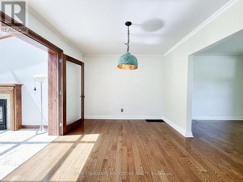 45 Madawaska Avenue S, Toronto, ON - Indoor Photo Showing Other Room With Fireplace