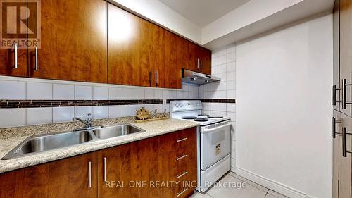 299A - 165 Cherokee Boulevard, Toronto, ON - Indoor Photo Showing Kitchen With Double Sink