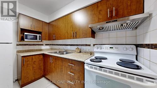 299A - 165 Cherokee Boulevard, Toronto, ON - Indoor Photo Showing Kitchen With Double Sink