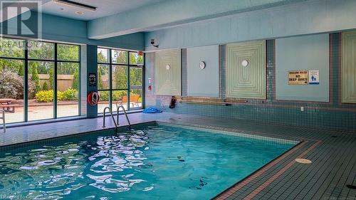 Swimming pool, hot tub sauna, fitness room, with wall-out to a beautiful patio. - 4450 Tucana Court Unit# 1010, Mississauga, ON - Indoor Photo Showing Other Room With In Ground Pool