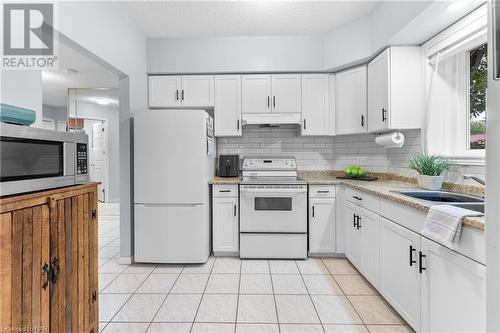 5753 Morrison Street Unit# 103, Niagara Falls, ON - Indoor Photo Showing Kitchen With Double Sink