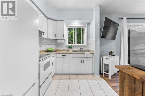 5753 Morrison Street Unit# 103, Niagara Falls, ON - Indoor Photo Showing Kitchen With Double Sink