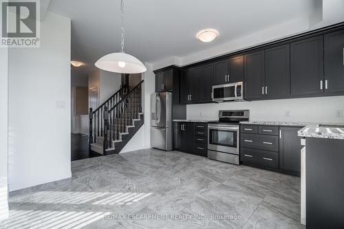 202 - 30 Times Square Boulevard, Hamilton, ON - Indoor Photo Showing Kitchen With Stainless Steel Kitchen