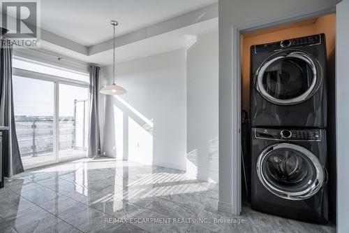 202 - 30 Times Square Boulevard, Hamilton, ON - Indoor Photo Showing Laundry Room