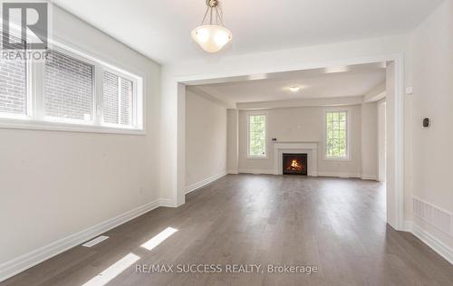 588 Queen Mary Drive, Brampton, ON - Indoor Photo Showing Living Room With Fireplace