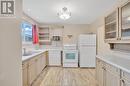 5549 Empress Street Unit# 63, Windsor, ON  - Indoor Photo Showing Kitchen With Double Sink 