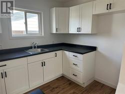 UPPER UNIT KITCHEN - 