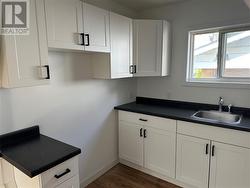 UPPER UNIT KITCHEN - 