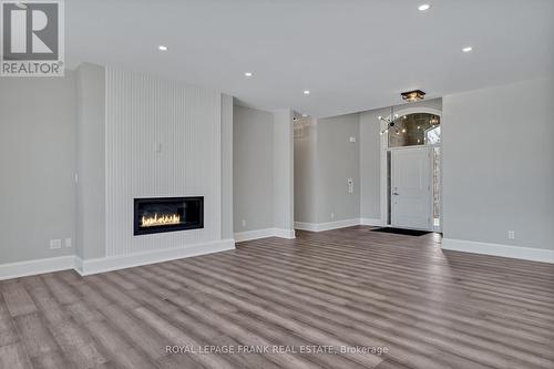 7 Nipigon Street, Kawartha Lakes, ON - Indoor Photo Showing Living Room With Fireplace