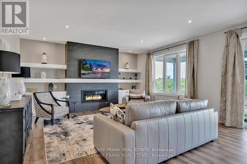 7 Avalon Drive, Kawartha Lakes, ON - Indoor Photo Showing Living Room With Fireplace