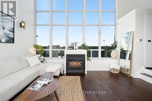 526 - 250 Manitoba Street, Toronto, ON - Indoor Photo Showing Living Room With Fireplace