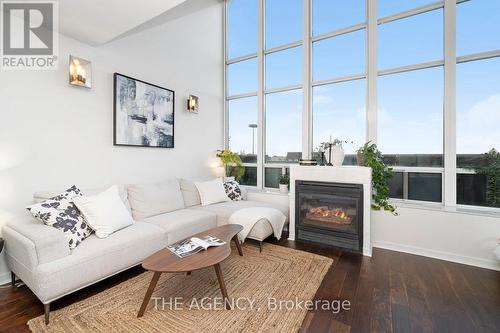 526 - 250 Manitoba Street, Toronto, ON - Indoor Photo Showing Living Room With Fireplace