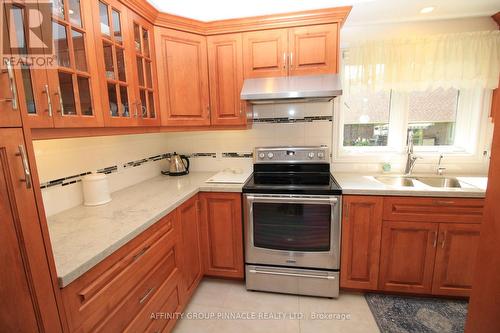 51 - 194 Cedar Beach Road, Brock (Beaverton), ON - Indoor Photo Showing Kitchen With Double Sink