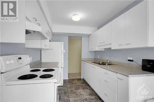 Bight Kitchen with plenty of storage & counter space - 54 Woodgate Way, Ottawa, ON - Indoor Photo Showing Kitchen With Double Sink