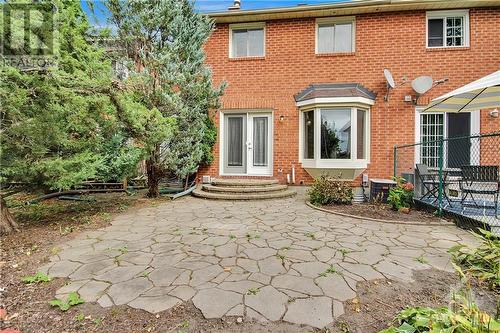 Private & beautiful Backyard with flagstone patio is a quiet space where you can unwind & relax - 54 Woodgate Way, Ottawa, ON - Outdoor