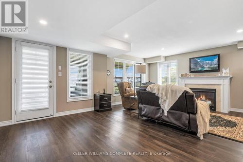 28 Pierre Trudeau Lane, Grimsby, ON - Indoor Photo Showing Living Room With Fireplace