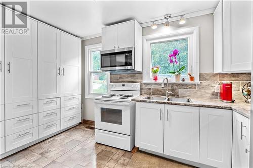 232 West 19Th Street, Hamilton, ON - Indoor Photo Showing Kitchen With Double Sink