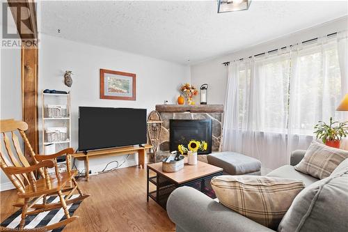 232 West 19Th Street, Hamilton, ON - Indoor Photo Showing Living Room With Fireplace